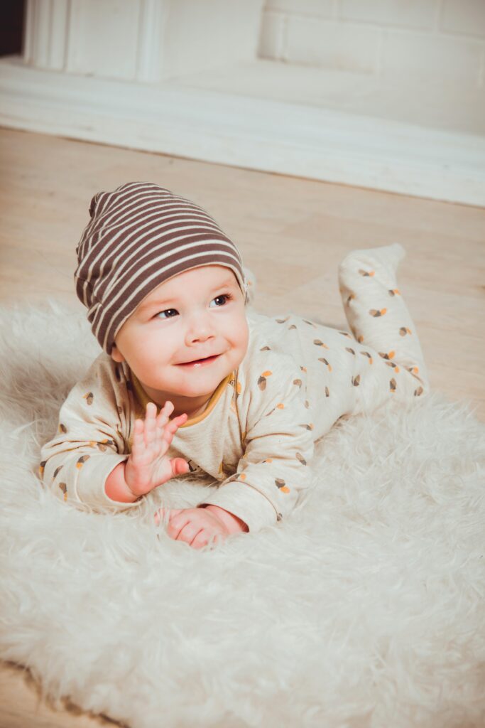 Smiling baby in tummy time